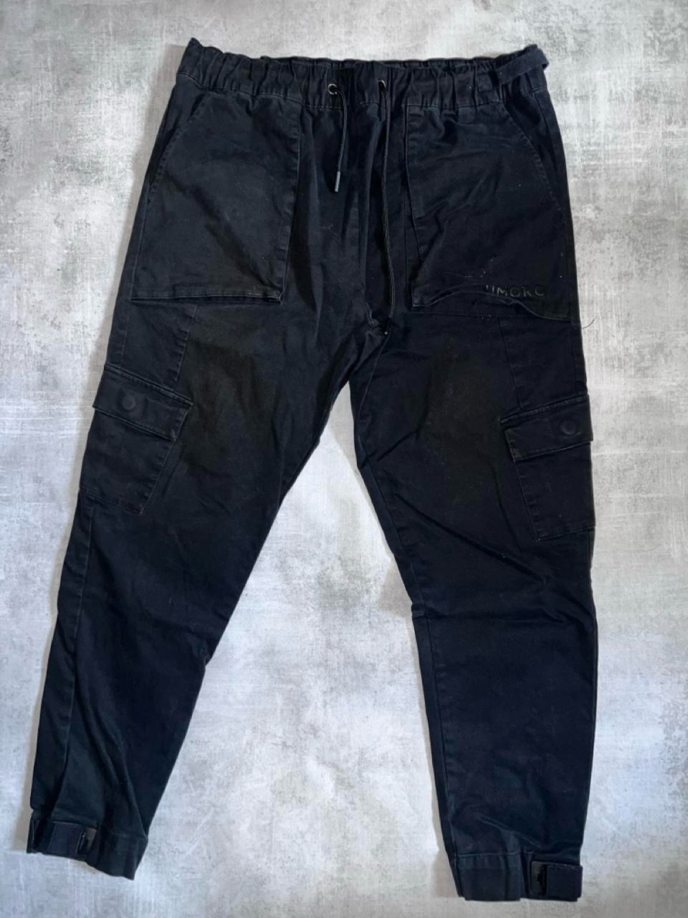 Umbro Tapered jogger silhouette featuring a drawcord elastic waistband